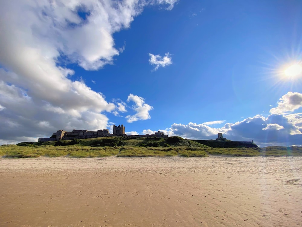 a beach with a castle on top of it