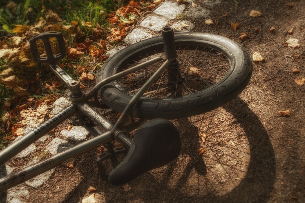 a bike that is laying on the ground