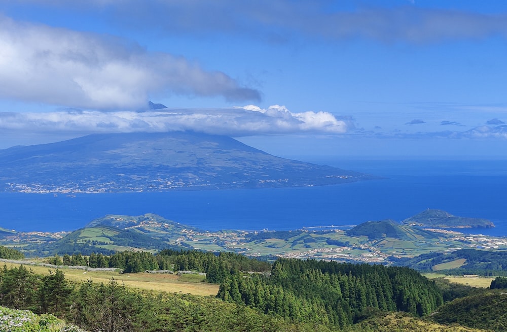 a view of a mountain and a body of water