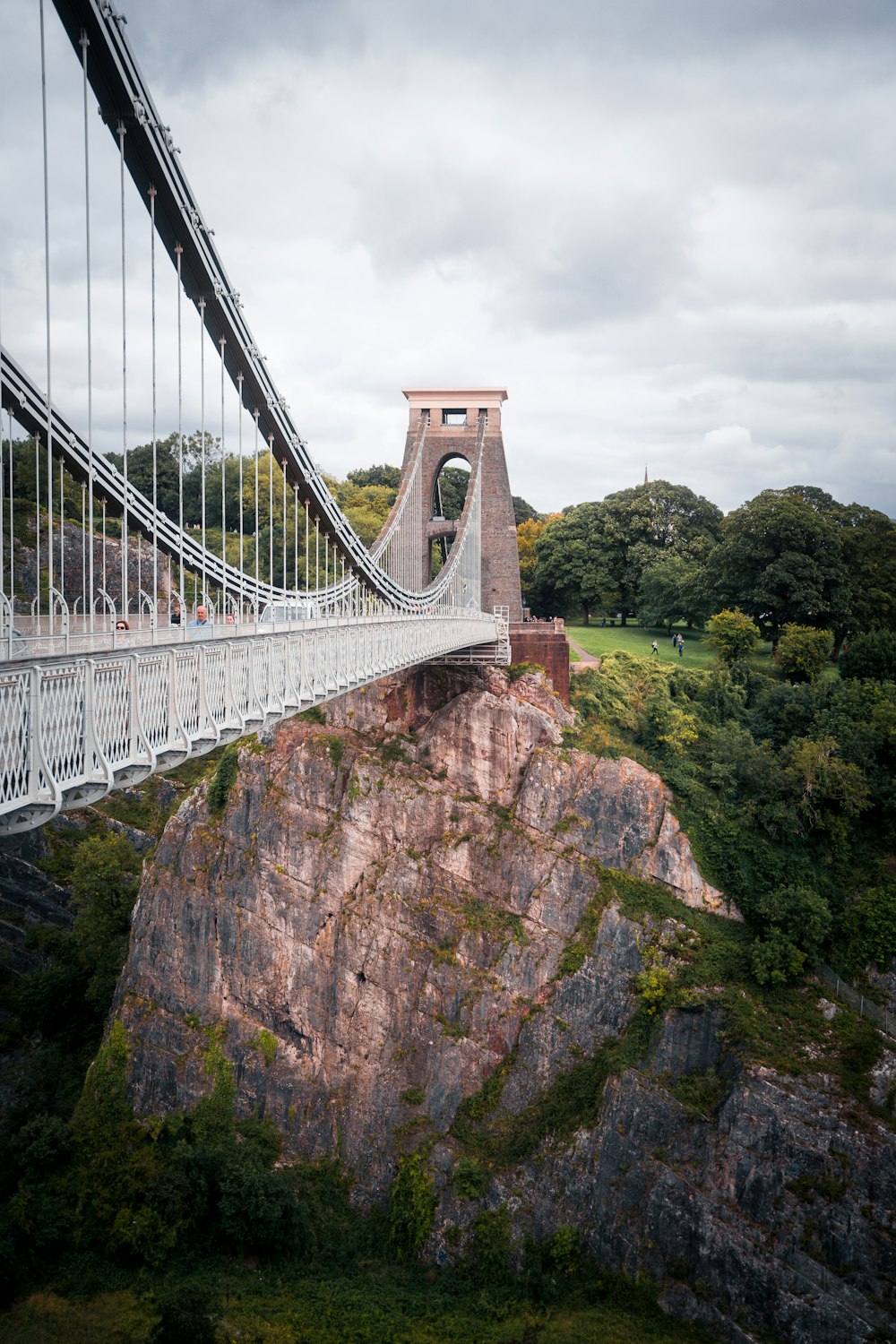 a suspension bridge spanning over a large body of water
