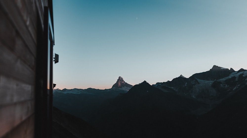 a view of a mountain from a window