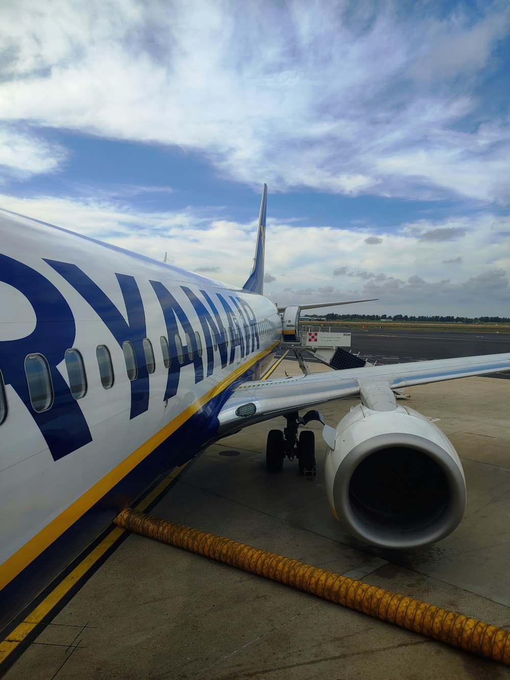 a large jetliner sitting on top of an airport tarmac