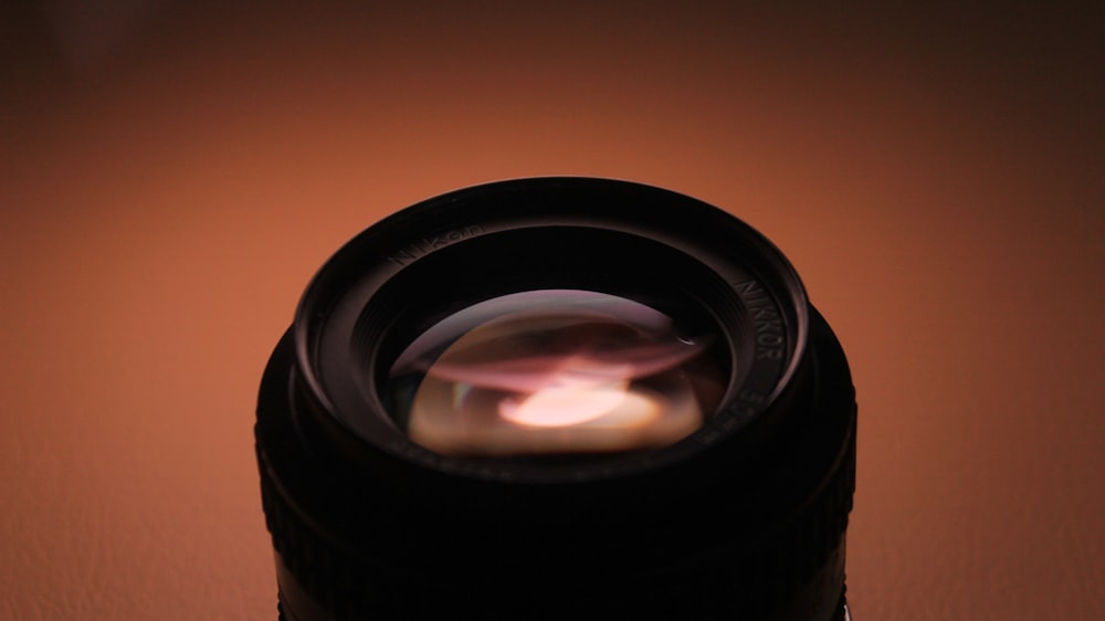 a close up of a camera lens on a table