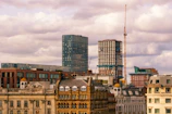 a view of a city with tall buildings