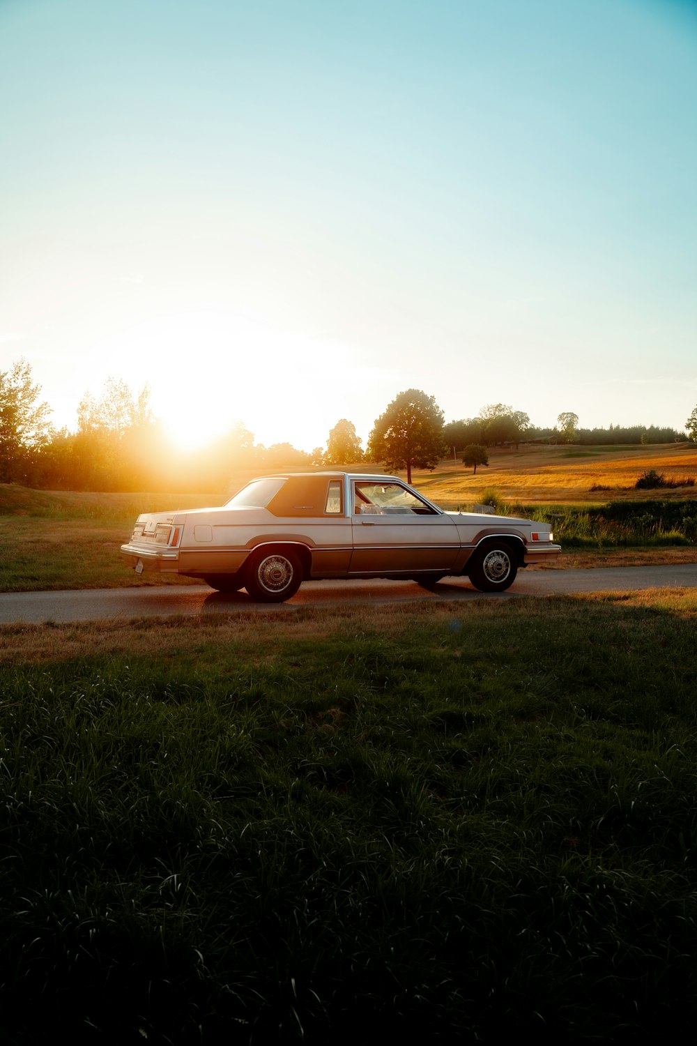 a car is parked on the side of the road