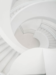a man riding a skateboard down a set of stairs