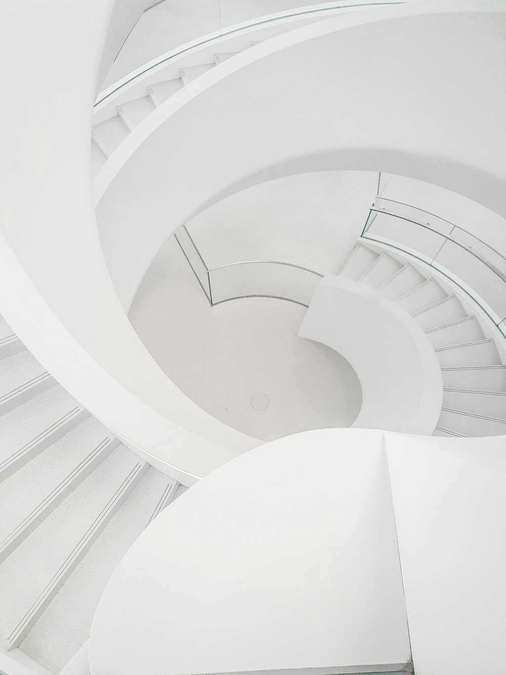 a man riding a skateboard down a set of stairs