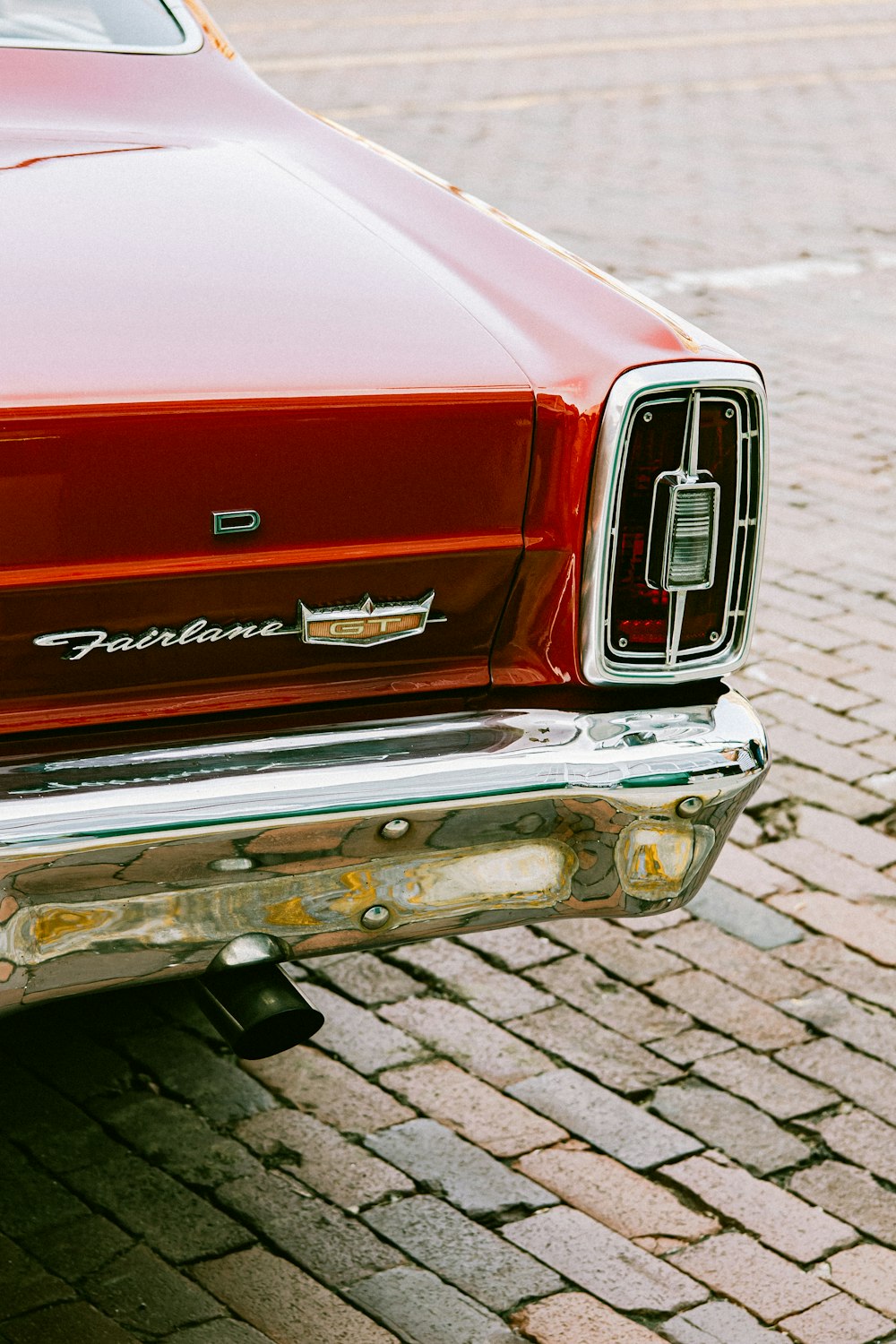 a red car parked on the side of the road