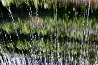 A cinematic still from an upcoming Vimaxfilms production featuring rain streak effects.