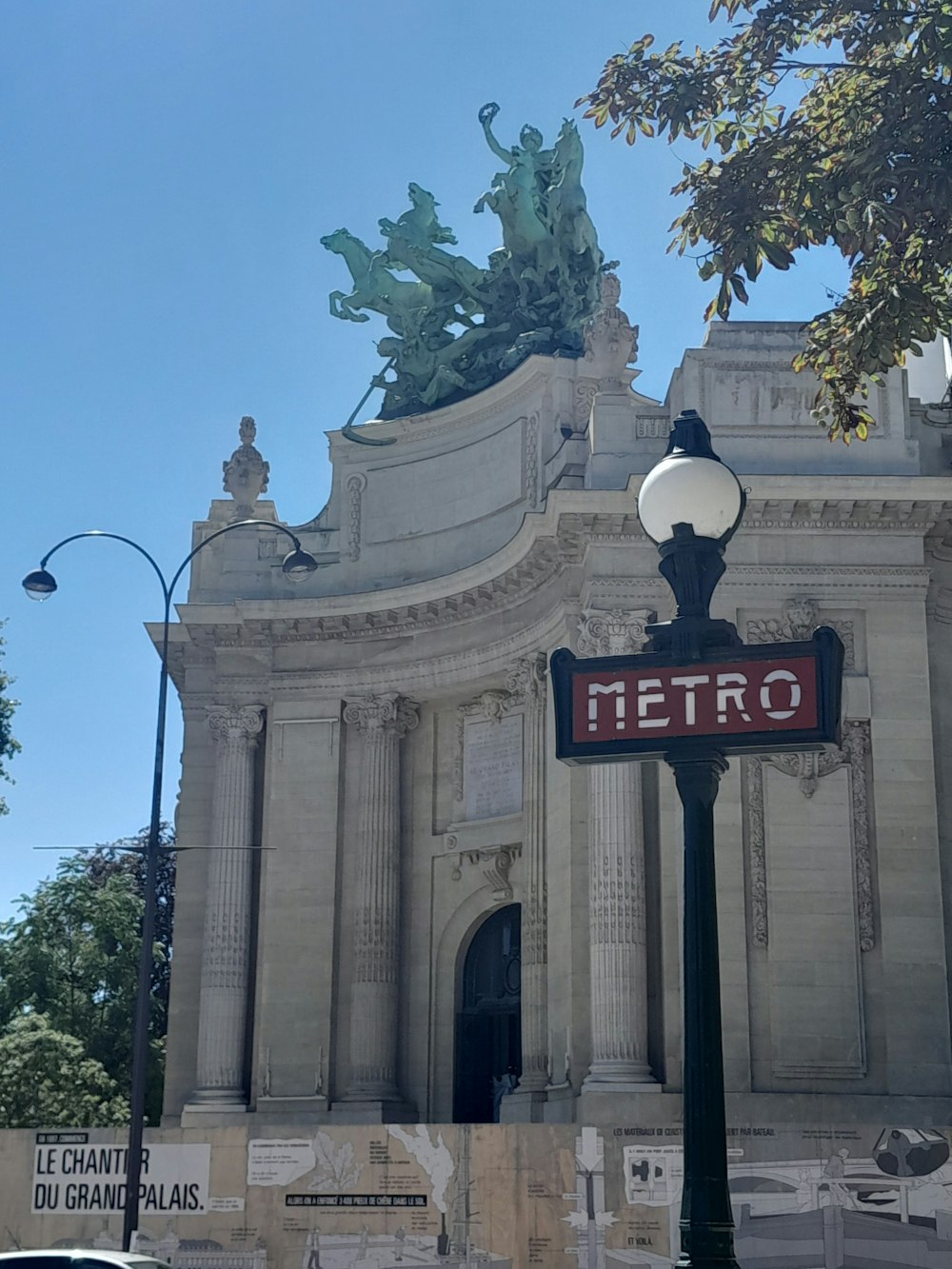 a building with a statue on top of it