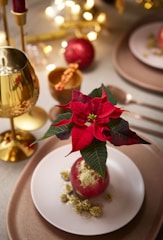 A close-up of a festive table set for an event.
