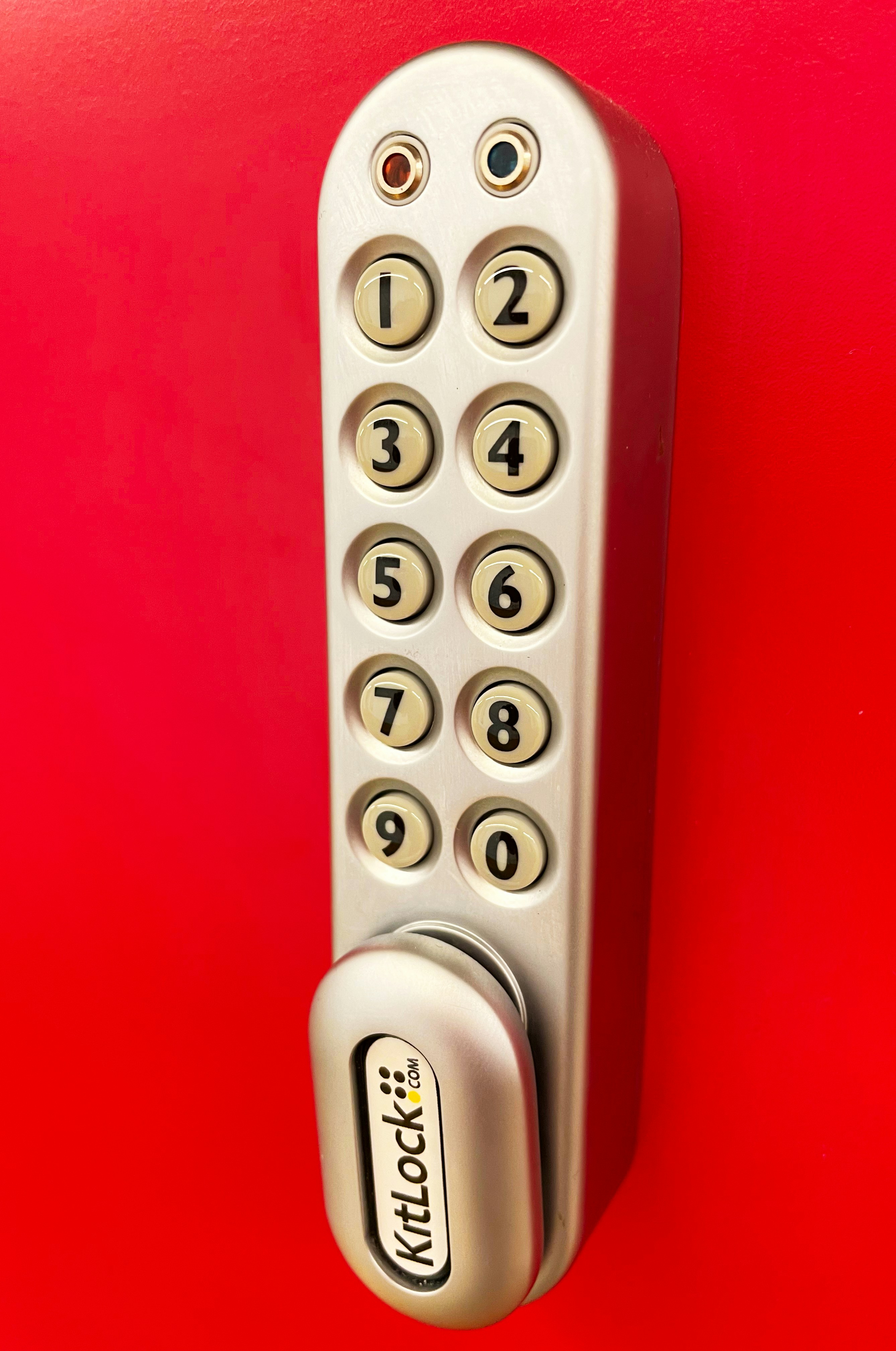 A close up of a remote control on a red surface photo – Free Text Image ...