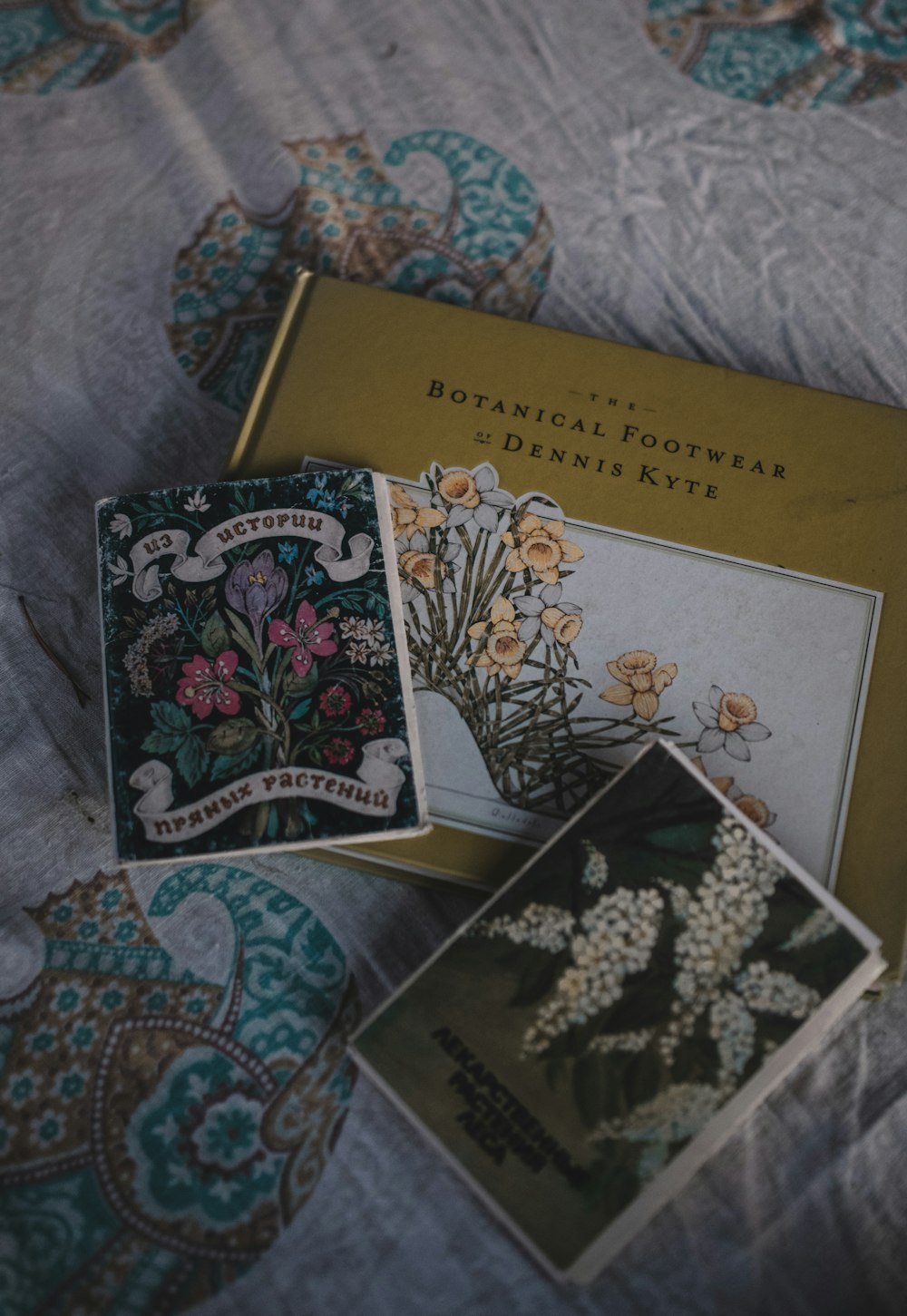 a box of decorative items sitting on a bed