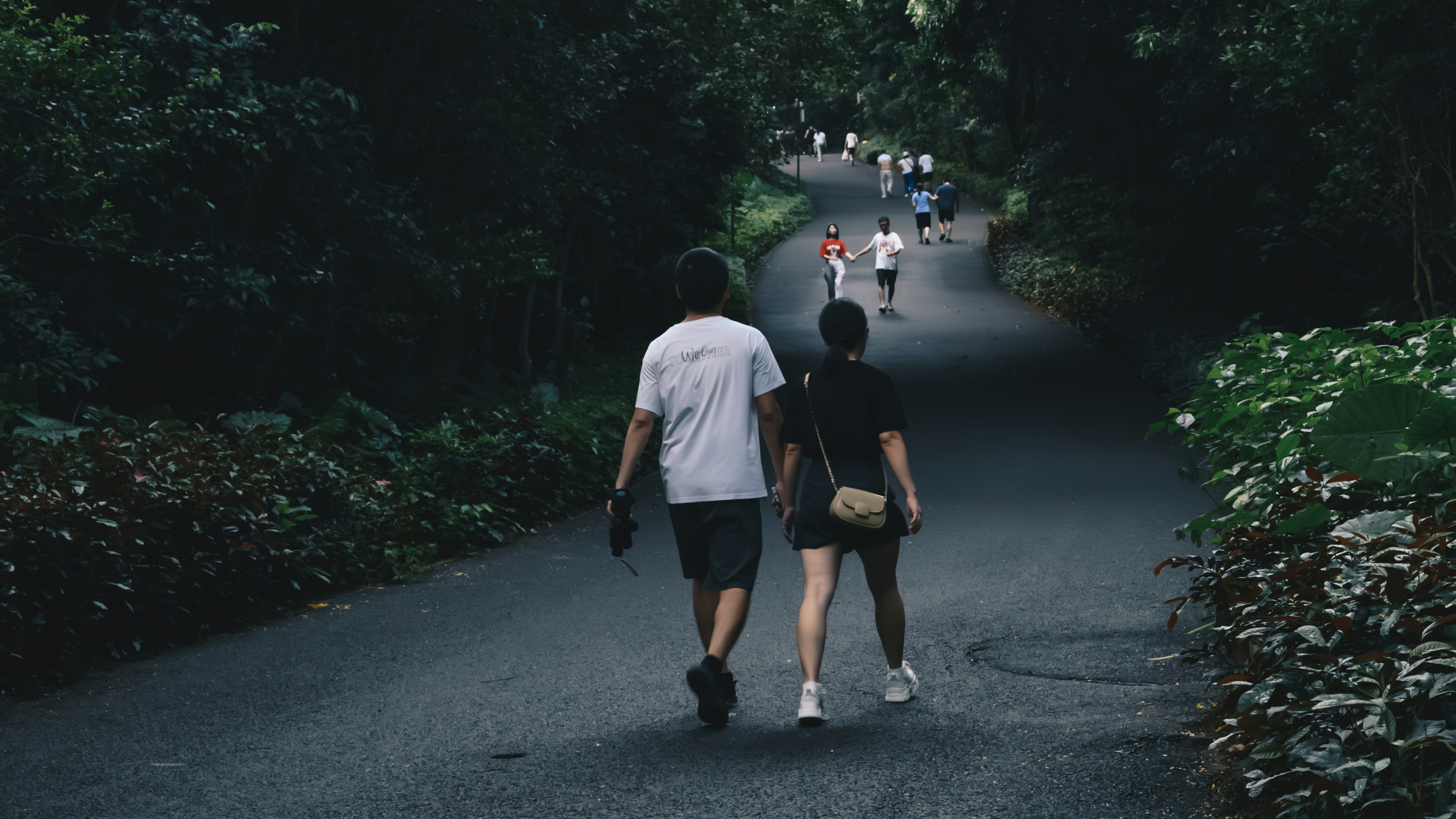 woman wearing yellow long-sleeved dress under white clouds and blue sky during daytime