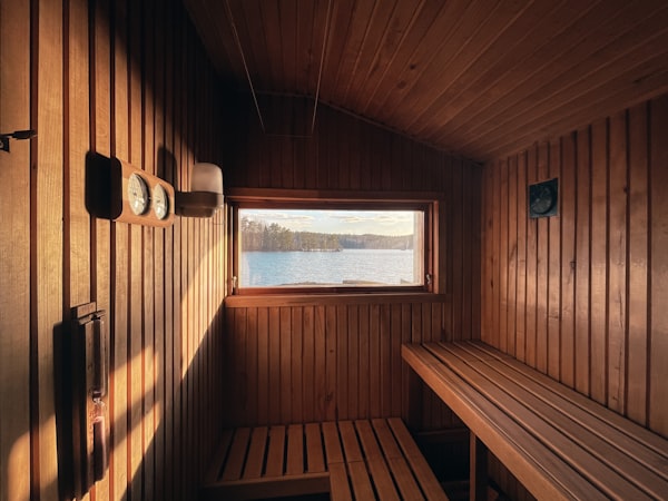 Cedar infrared sauna interior with warm amber glow