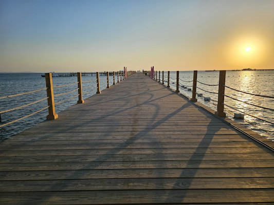 A long wooden pier stretching out into the ocean — Hurghada, Egypt