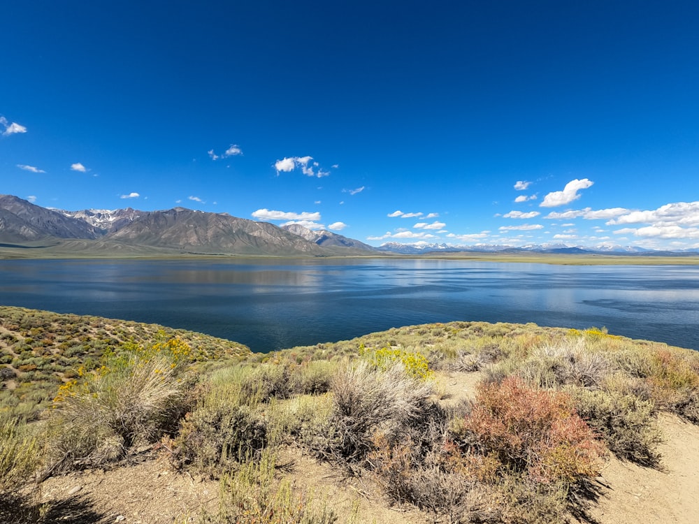 a large body of water surrounded by mountains