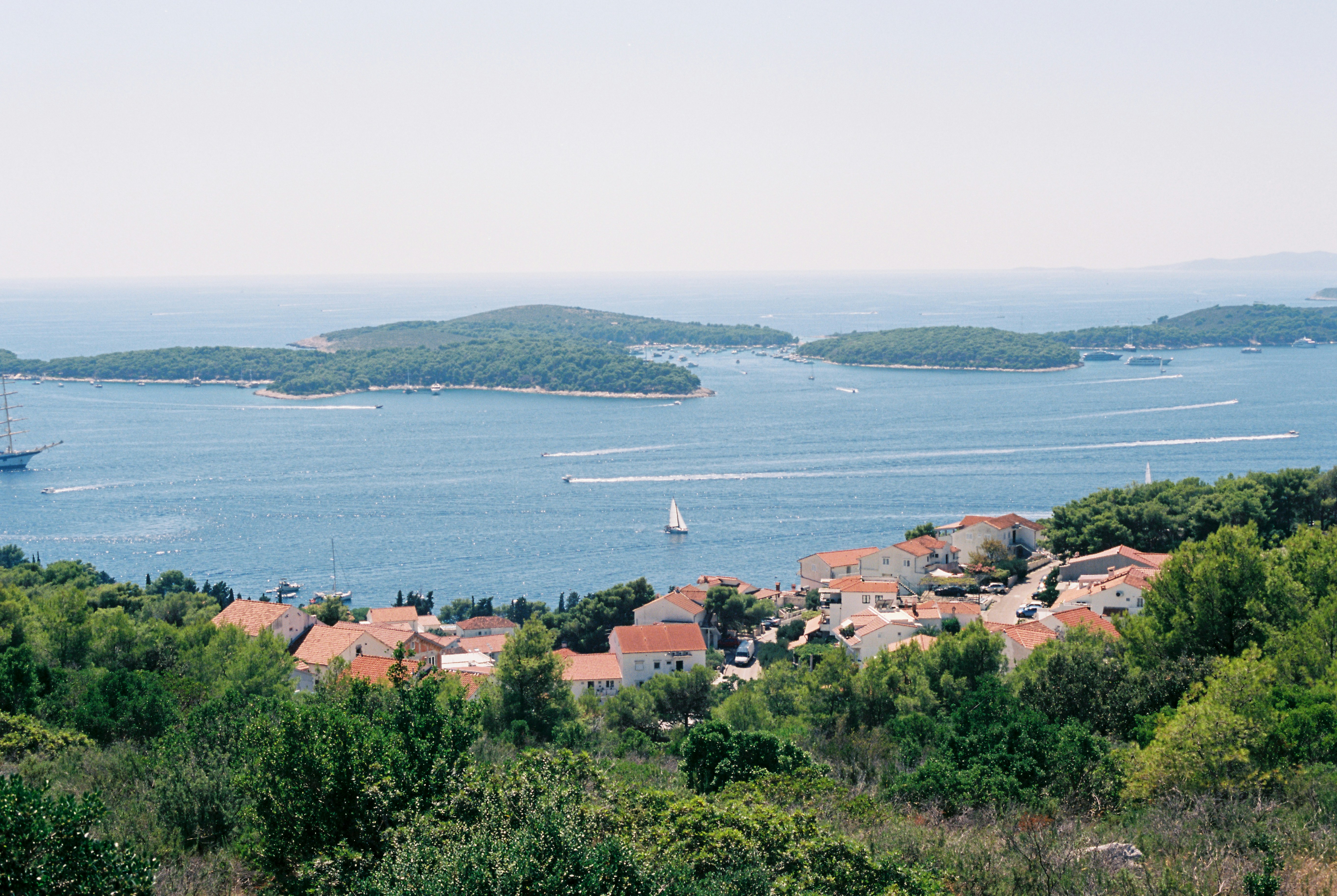 a view of a bay with a boat in the water, 