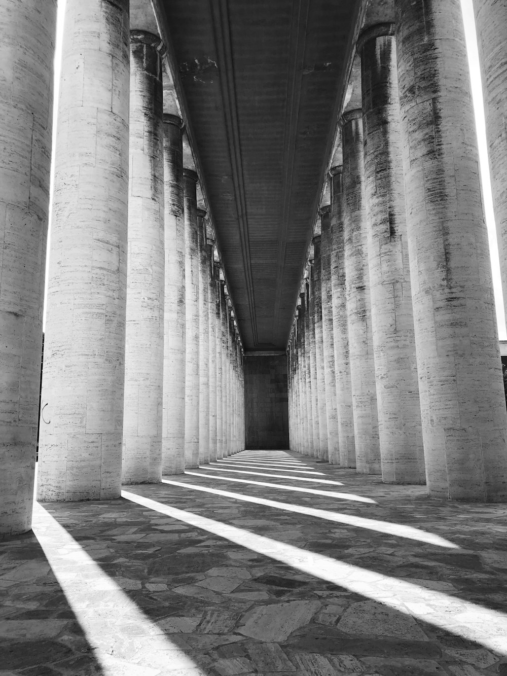 a black and white photo of a bridge