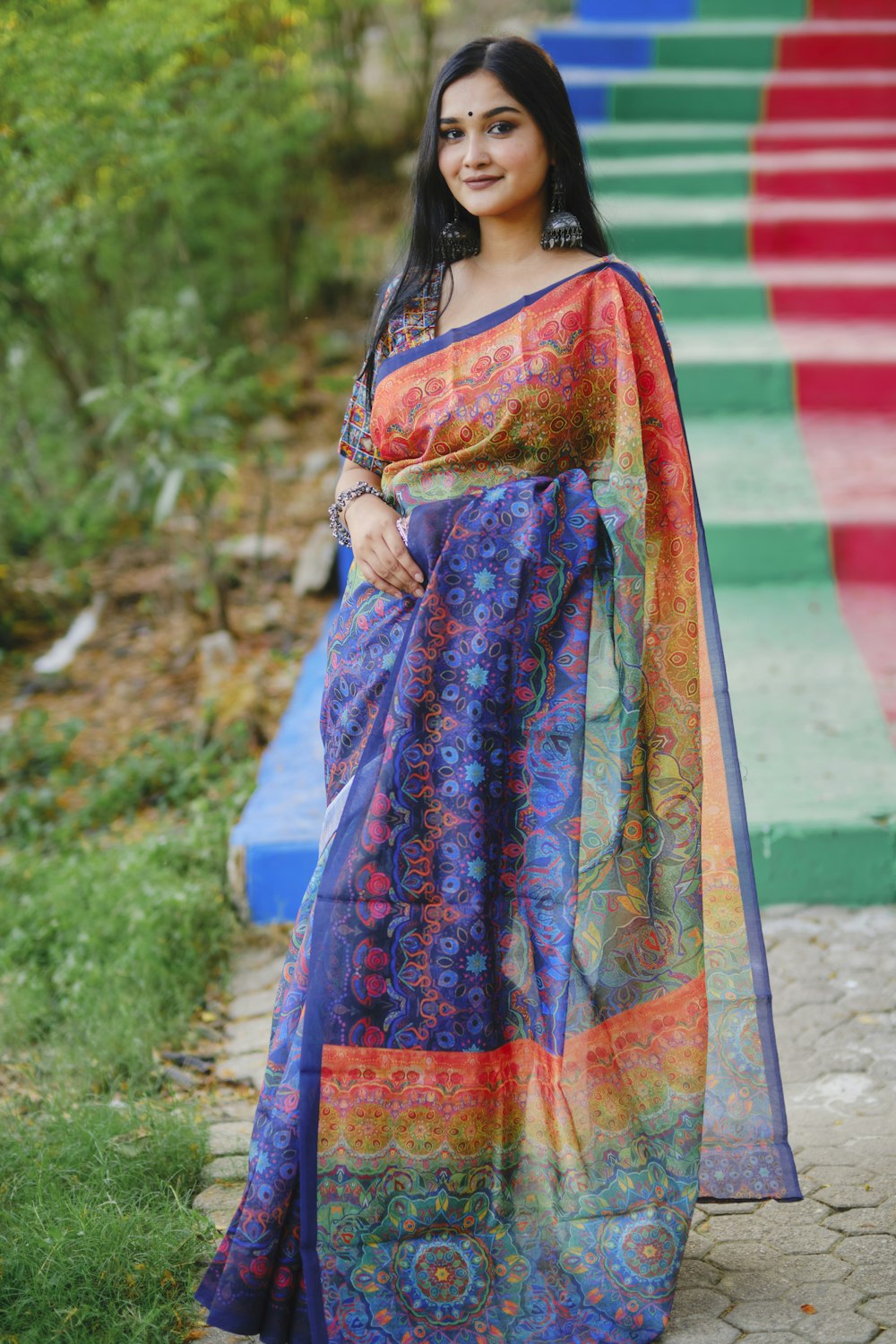 a beautiful woman in a colorful sari