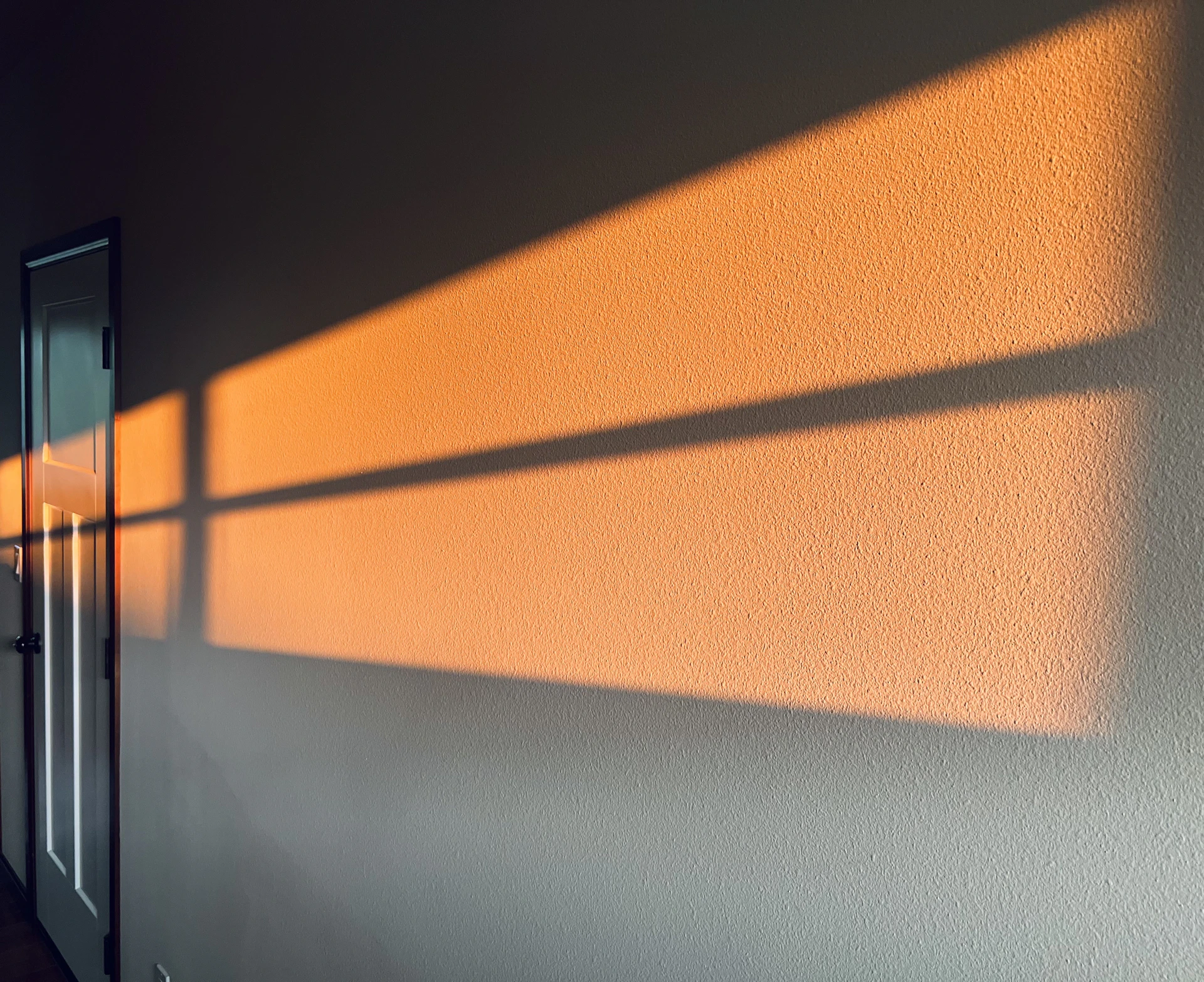 woman wearing yellow long-sleeved dress under white clouds and blue sky during daytime