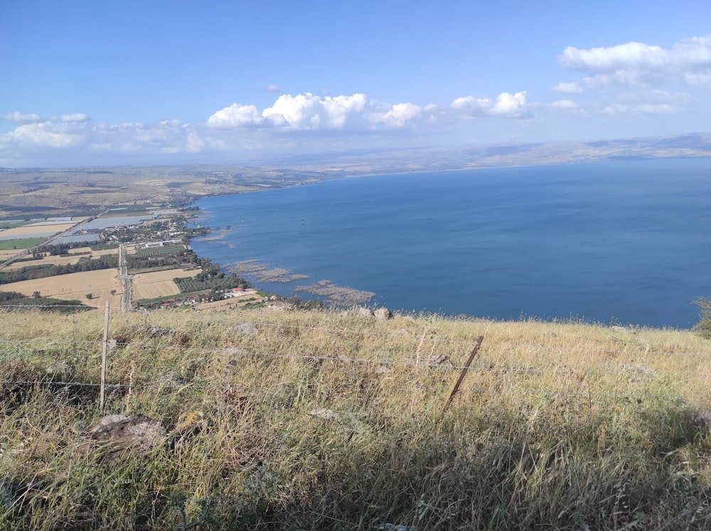 a view of a body of water from a hill