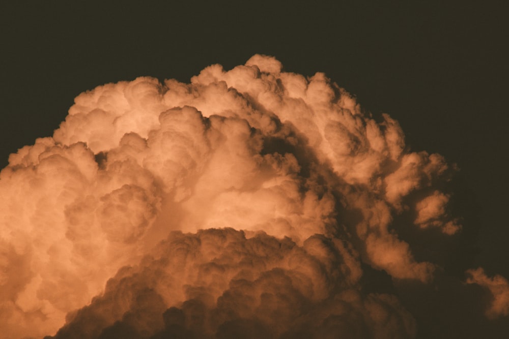 a very large cloud in the sky at night