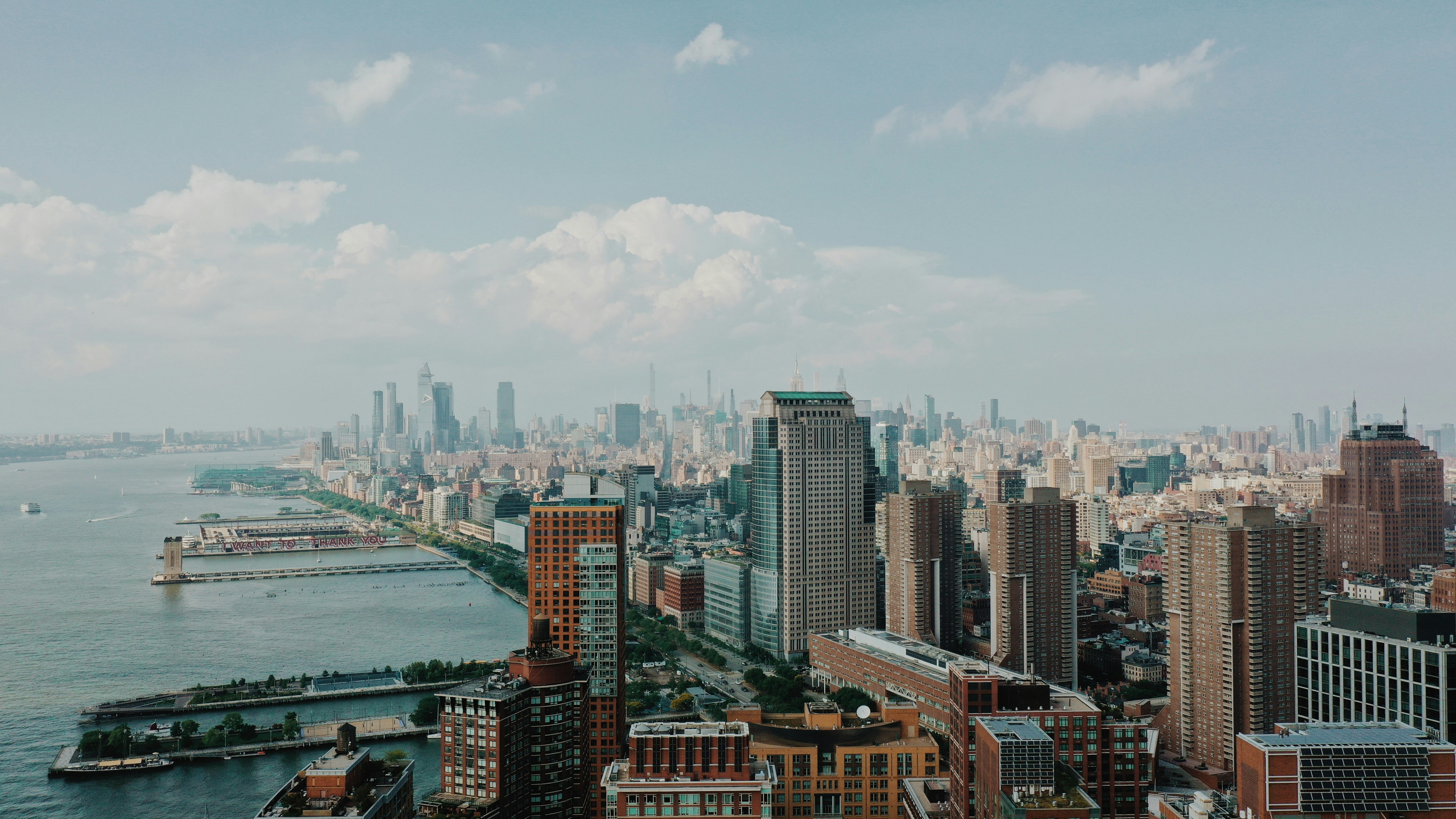 a large body of water surrounded by tall buildings