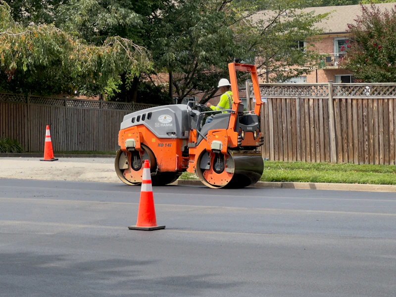 Road crew working on road surface