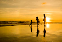 A family enjoying a beach holiday