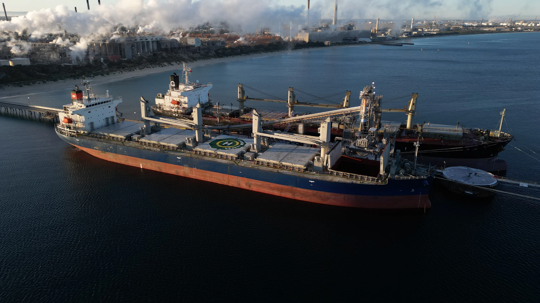 Industrial tanker vessel at marine terminal