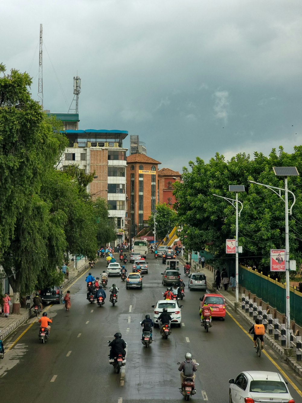 a city street filled with lots of traffic