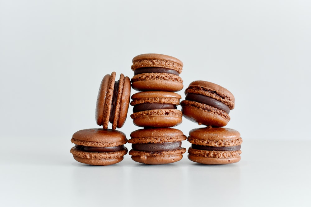 a stack of chocolate covered cookies sitting on top of each other