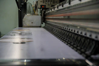 a close up of a conveyor belt in a factory