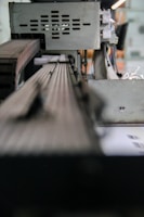 a close up of a machine cutting a piece of wood