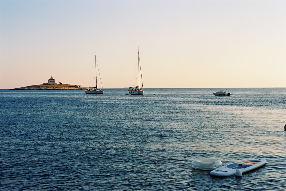 a body of water with boats in the distance