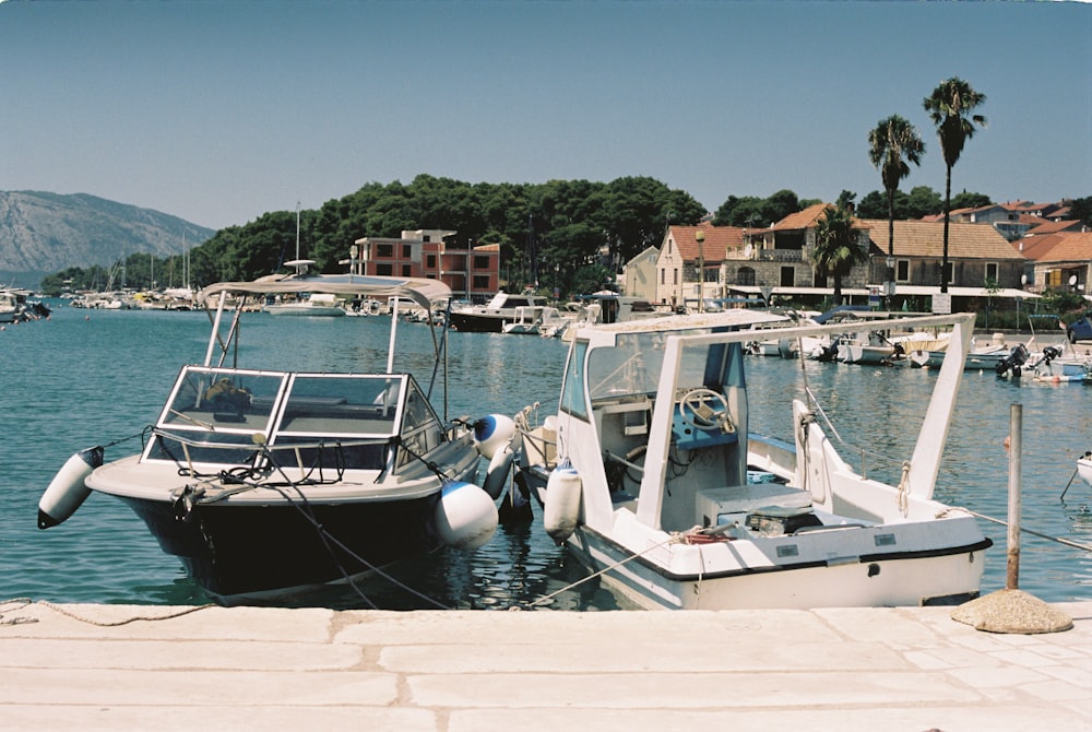 a couple of boats that are sitting in the water