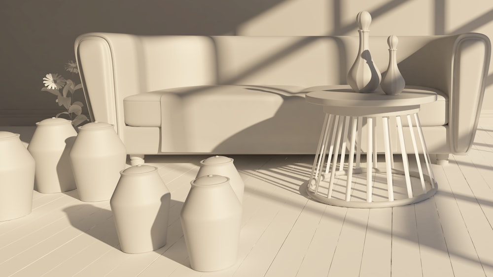 a living room with white furniture and white walls