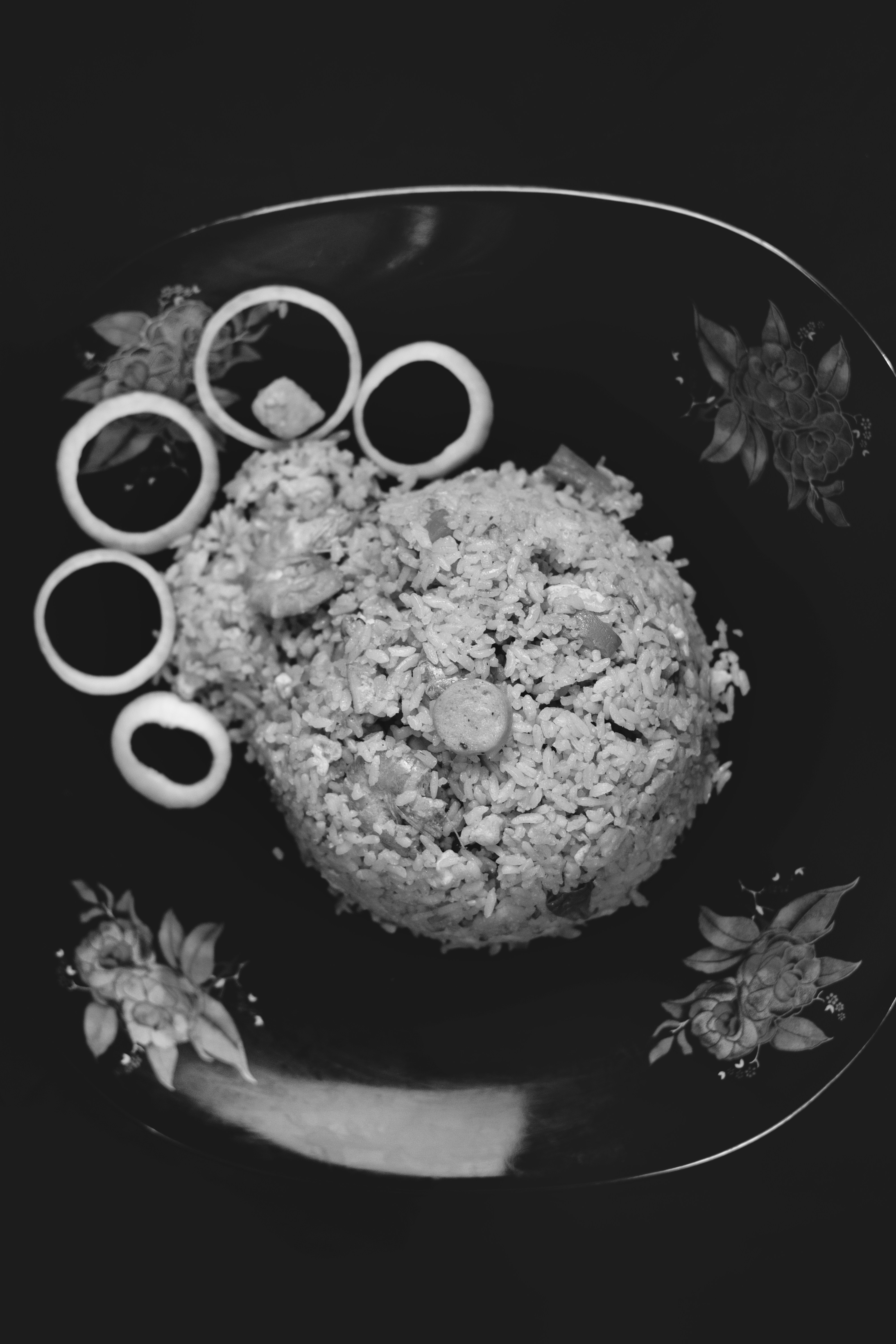 a black and white photo of food on a plate
