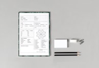 Notes and checklists laid out on a desk, reflecting criteria for course evaluation.