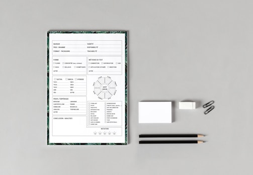 Step-by-step checklist with forms and notes laid out neatly on a table.
