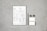 A document with checkboxes and text is placed on a flat, textured gray surface. Next to it, there is a black pencil, two black binder clips, and two small blank cards. The document appears to be some kind of form or template, featuring French text and various sections for input or selection.
