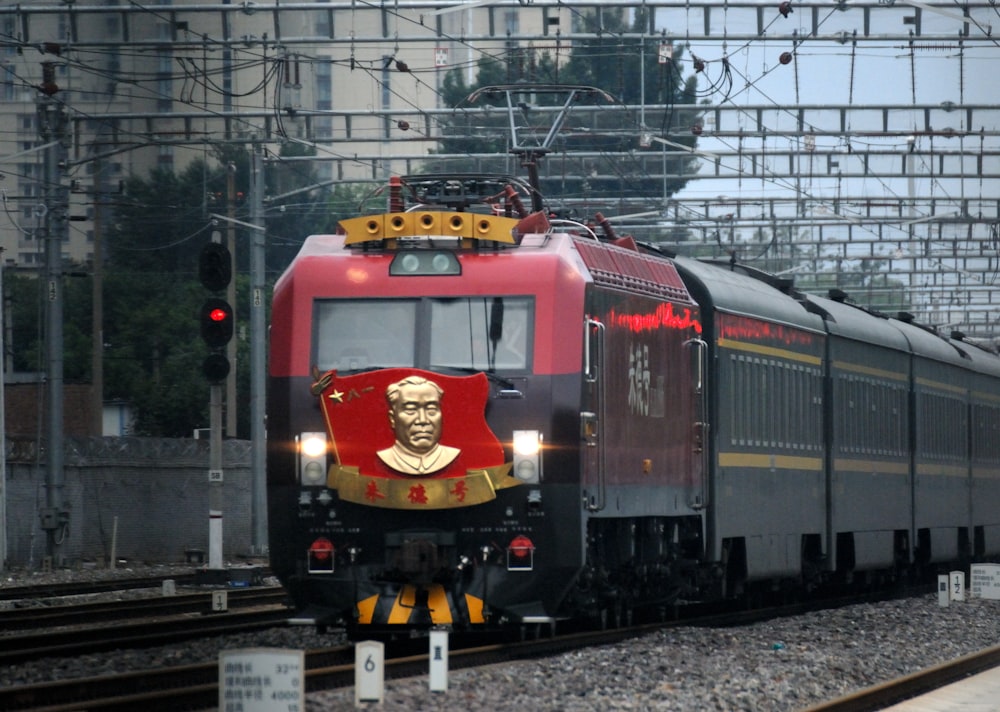 a train with a picture of a man on the front of it