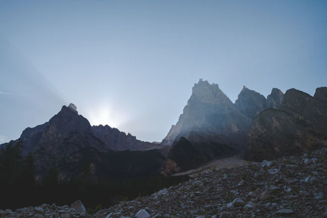 Golden morning light casting long shadows on the rocky Saint Catherine mountains.