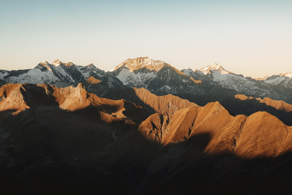 a view of a mountain range at sunset