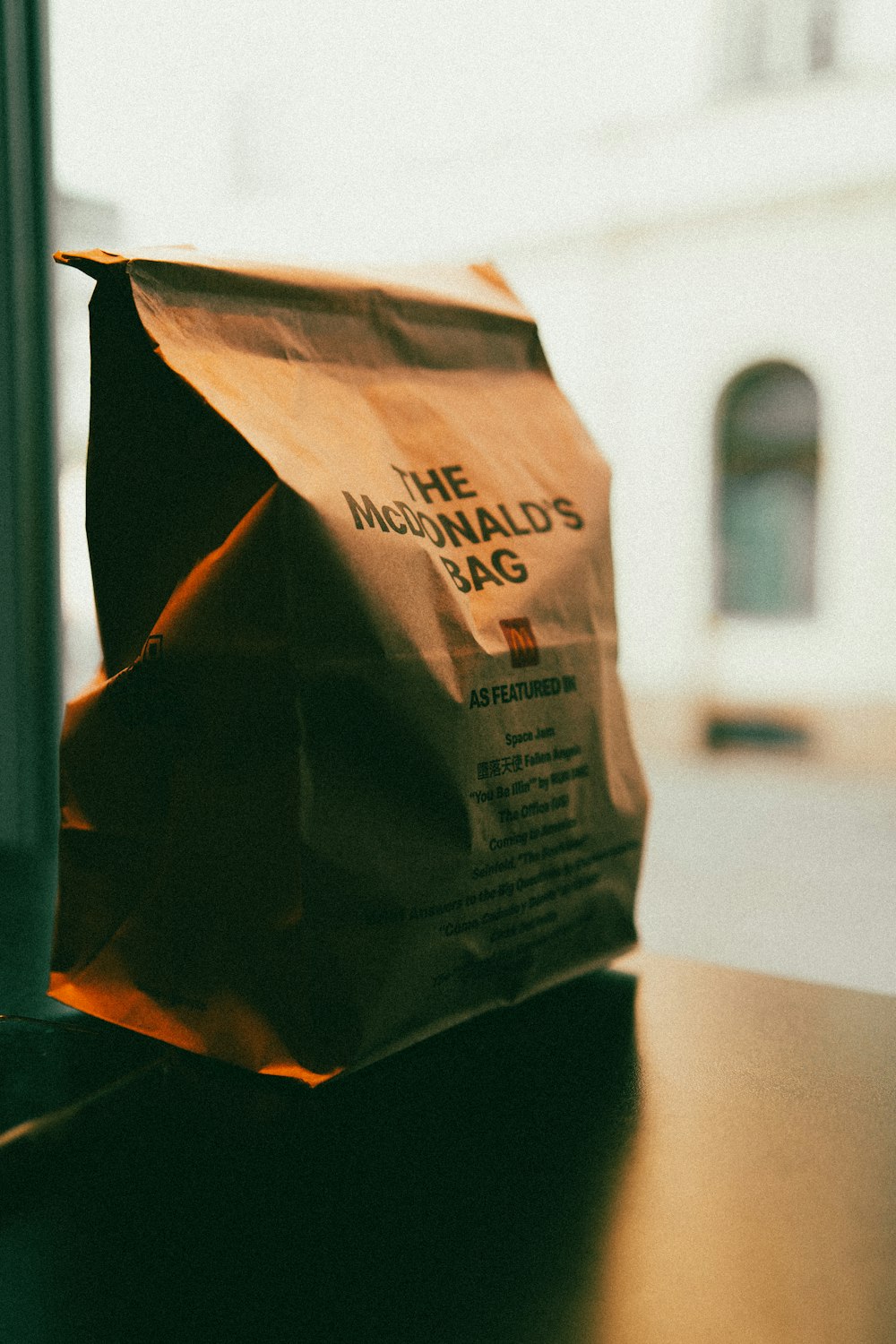 a brown paper bag sitting on top of a table