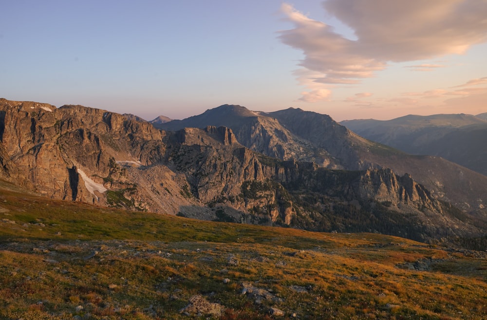 a view of a mountain range at sunset