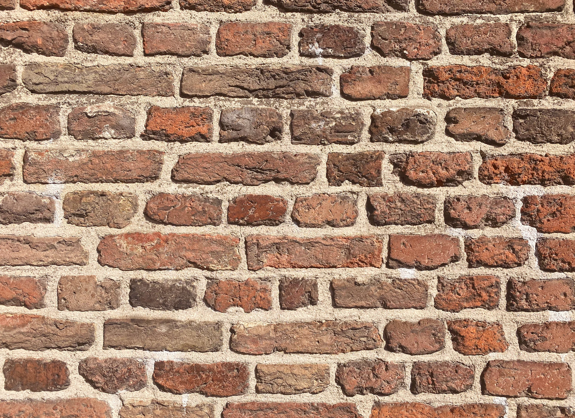 a close up of a brick wall made of bricks
