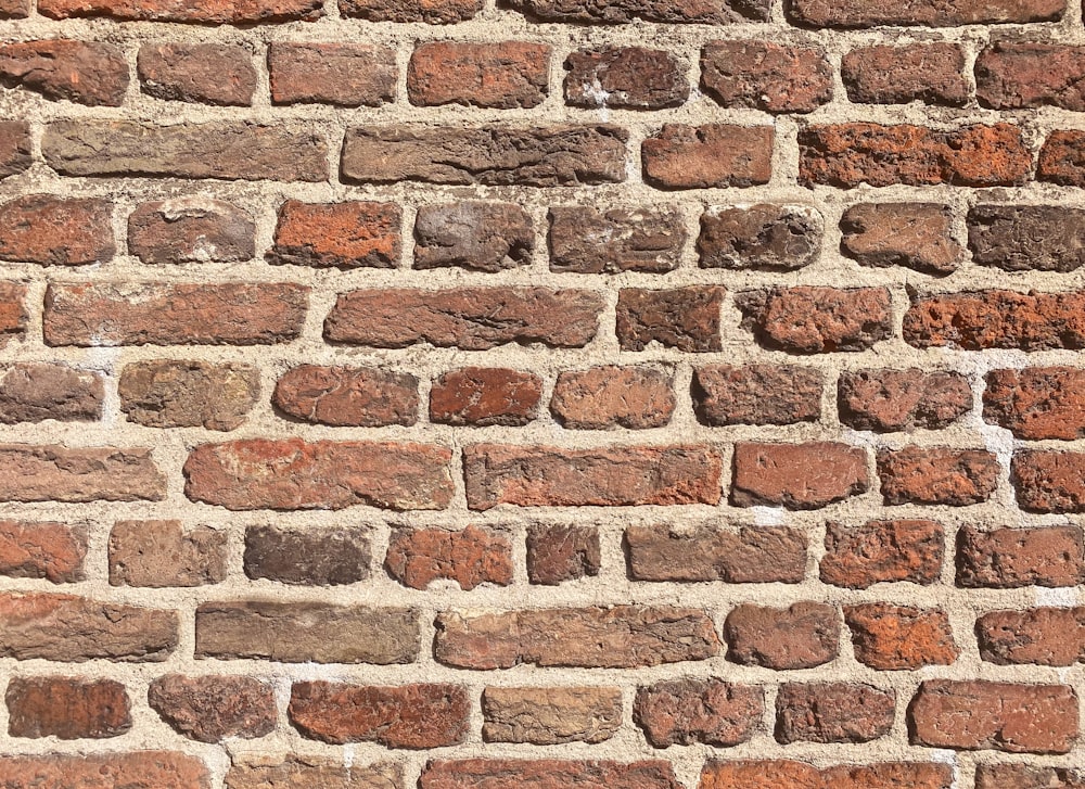 a close up of a brick wall made of bricks