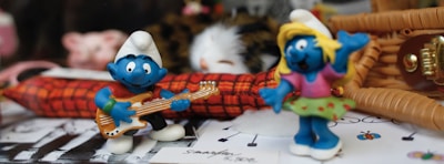 Ben playing a small keyboard surrounded by whimsical storybook characters.